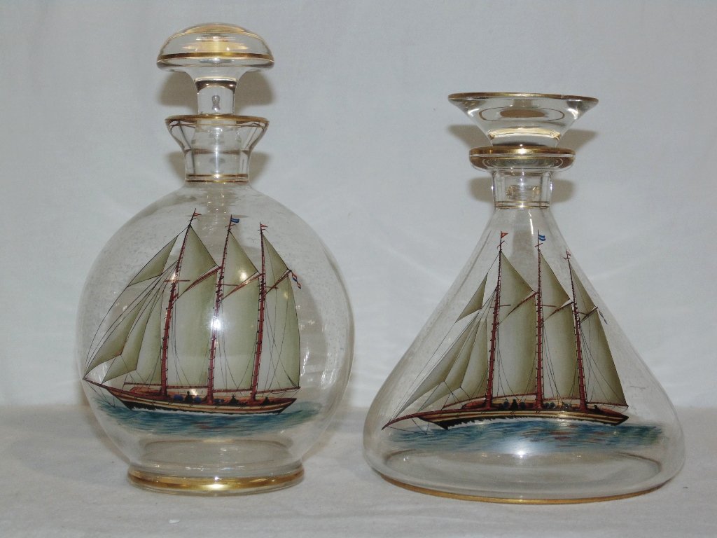 Pair Vintage Hand Painted Decanters with Sailing Boats: Pair Vintage Hand Painted Decanters with Sailing Boats.Great vintage pair of decanters with matching Sail Boats to each. Ships decanter is app. 7 3/4" tall ( with stopper having loss as shown)and othe