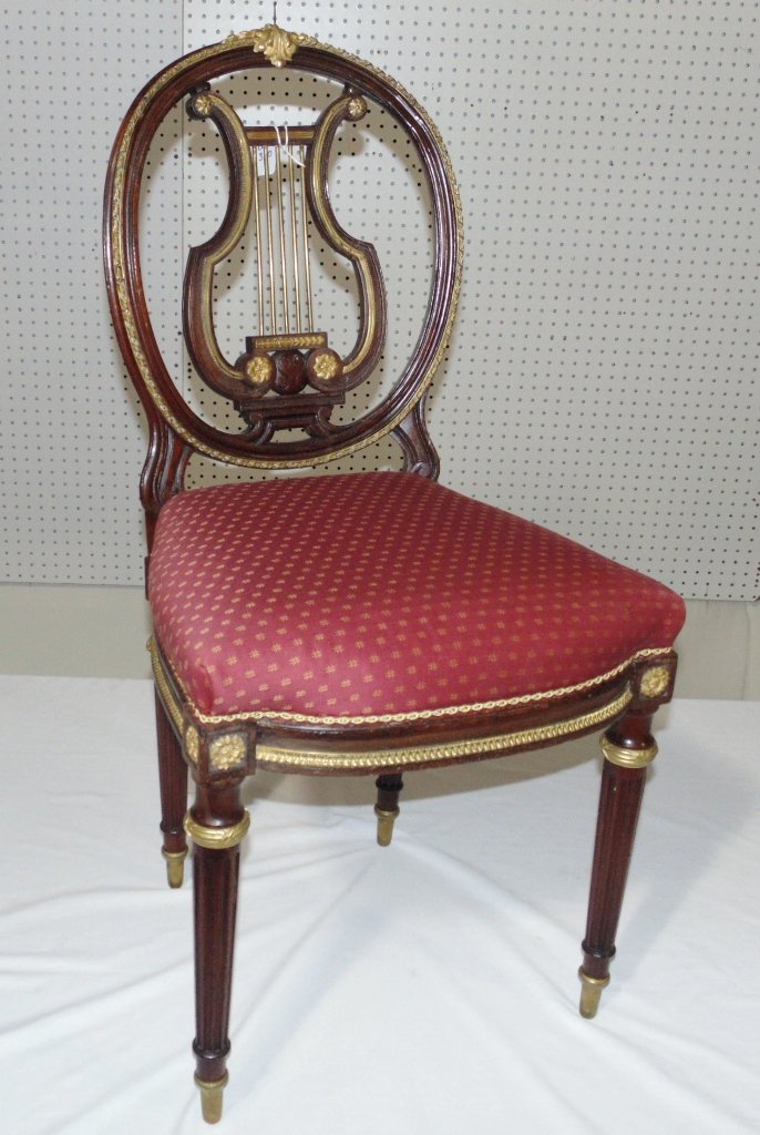 Fine 19th C. French Bronze Mount Lyre Back Chair: Fine 19th C. French Bronze Mount Lyre Back Chair.Great early bronze mounted chair with super fine Gilt Bronze decorations throughout chair, has a Lyre center and is app.35" tall,17" wide and 17" deep.