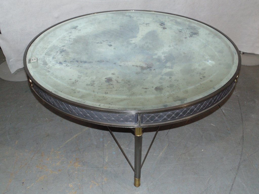 Mid C. Modern Jansen Style Mirrored Top Coffee Table: Mid C. Modern Jansen Style Mirrored Top Coffee Table.Great table with a smoked mirror to[p resting on a nickel silver steel base in Drum form with large bronze floral accents.Table is 48" across and 2