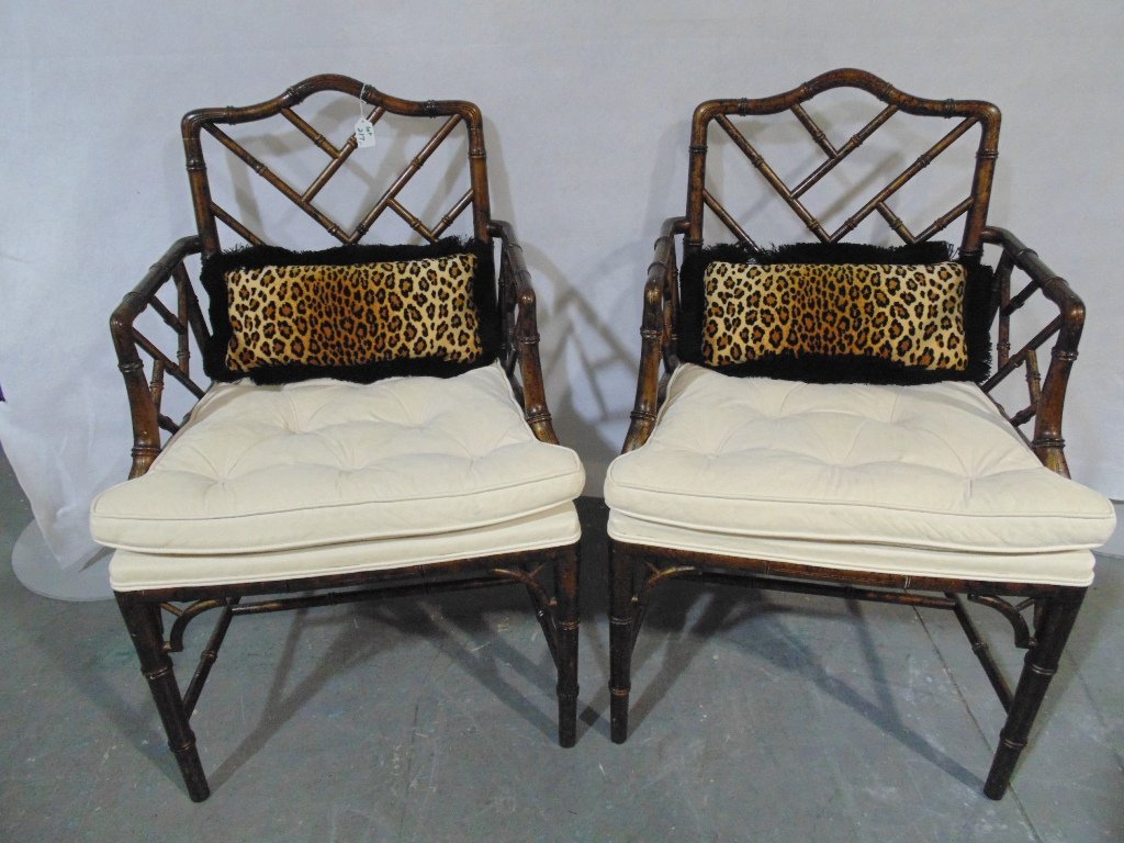 Pair of 20th C. Chinese Chippendale Arm Chairs: Pair of 20th C. Chinese Chippendale Arm Chairs.Great pair of arm chairs finished in a fabulous tortoise shell color. Each is 36" tall, 23" wide and 23" deepEach has attached cushions.