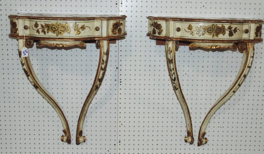 Pair of Vintage Italian Wall mount Consoles: Pair of Vintage Italian Wall mount Consoles.Each is app.28 1/2" tall,22" wide and 12" deep. Decorated with Flower designs to each. Has old repairs as shown.