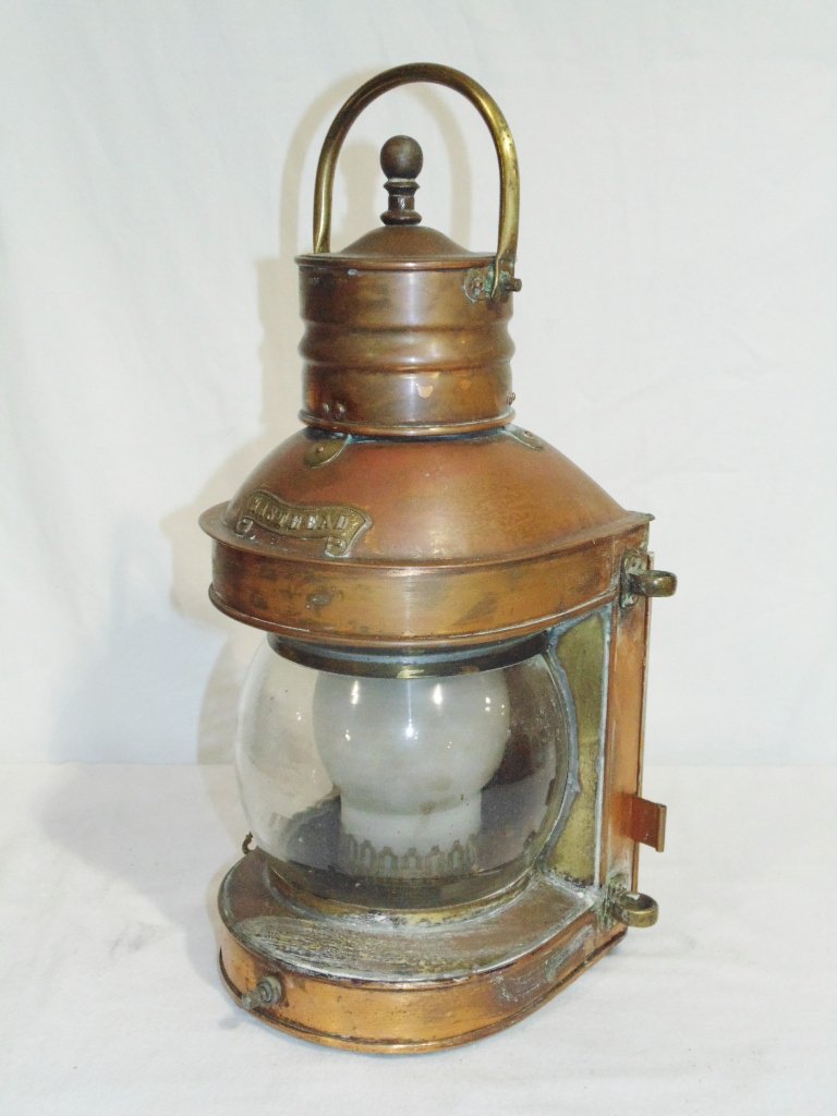 Early British Masthead Copper Ships Lantern: Early British Masthead Copper Ships Lantern, Now electrified as lamp.Stands 18" to top of handle and app.9" wide and 7 1/2" deep.