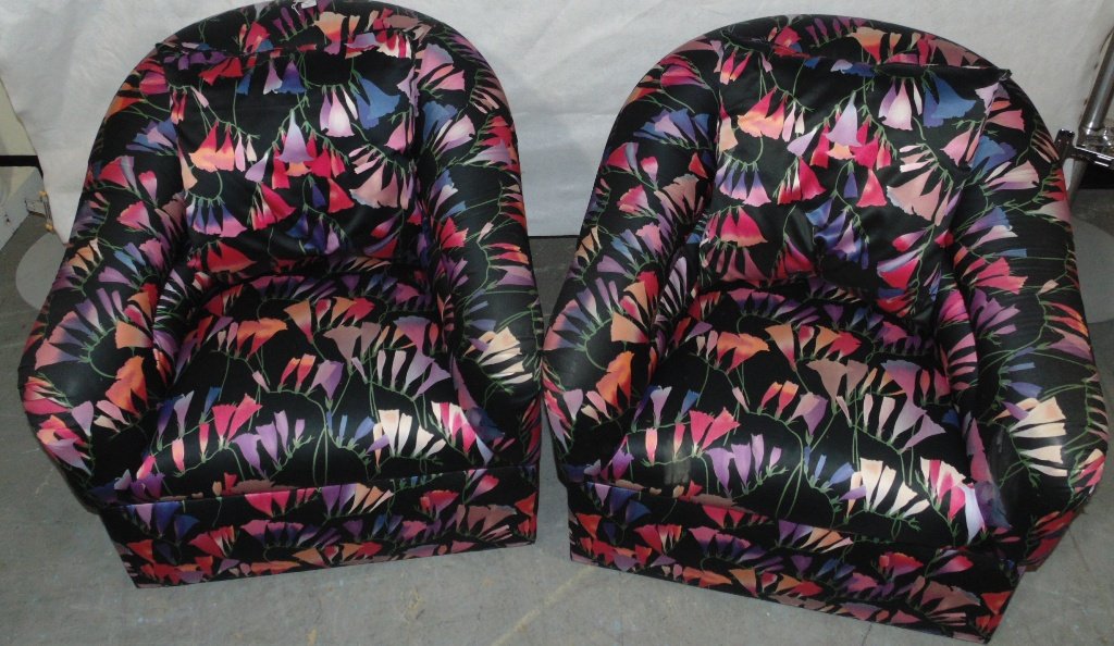 Pair of Mid C. Modern Dunbar Style Swivel Tub Chairs: Pair of Mid C. Modern Dunbar Style Swivel Tub Chairs.Great pair of chairs in a multi colored fabric.Stands 32 1/2" tall,32 1/2" wide and app.34" deep.Each with pillow. Matches previous lot 106.