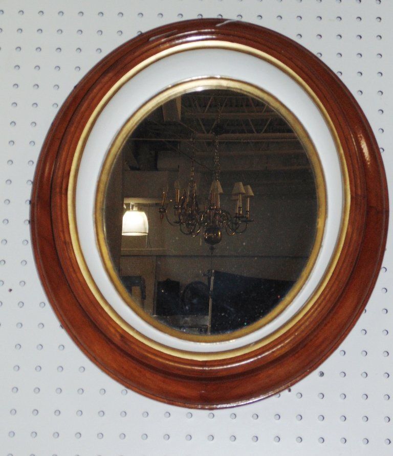 19th C. Oval Cherry Wood Mirror: 19th C. Oval Cherry Wood Mirror. Very deep in a shadow box style with a white painted center. Mirror is app.19" x 17" wide.