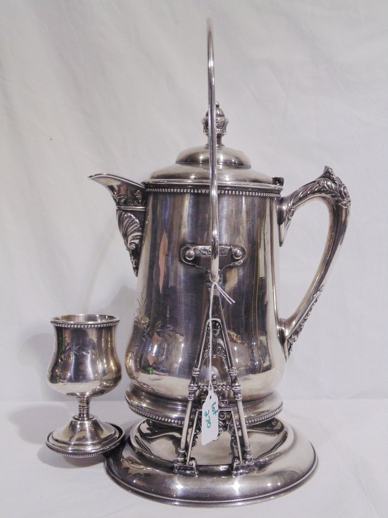 Victorian Silver Plate Tea Kettle & Stand, w/ Cup: Victorian Silver Plate Tea Kettle & Stand, w/ Cup.Made by Superior Silver Co..Kettle is 12 1/2" tall,10 1/2" from spout to handle,overall height is 17 1/2" tall.Kettle stand has tray for cup and cup i