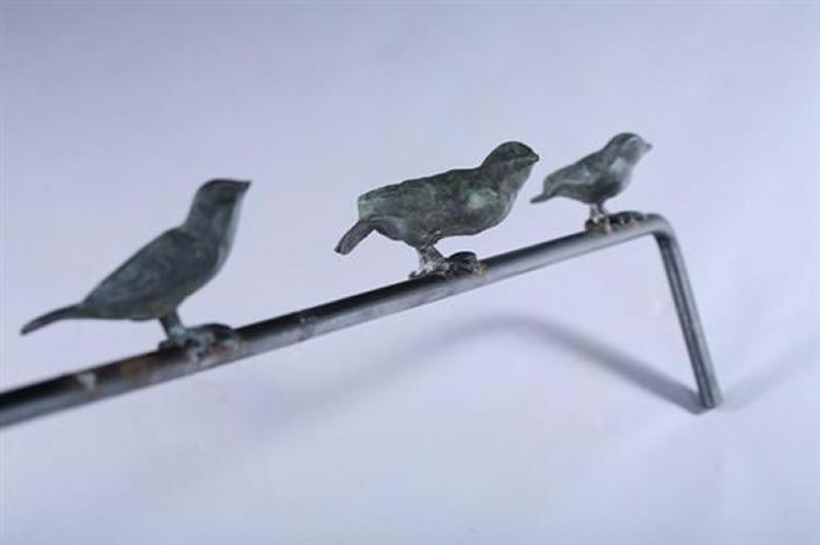Ilana Goor (1936 - ) Bronze Sculpture, Birds on a Wire: Ilana Goor (1936 - ) Bronze Sculpture, Birds on a Wire.A fine signed Bronze & Iron Sculpture with 7 small Bronze Birds,Signed on base of 2 birds.Length:7'Depth:7"