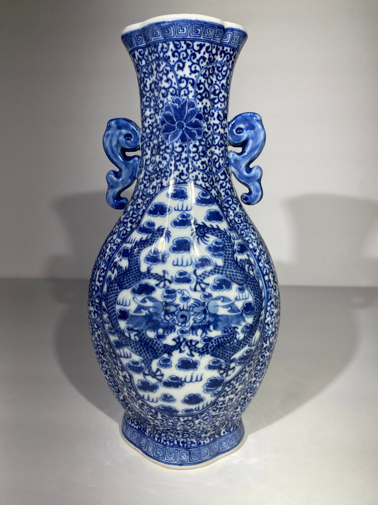 Chinese porcelain Blue and white Vase dragons and 4 character mark: Chinese porcelain Blue and white Vase dragons and 4 character mark..10” tall..Not sure if age!