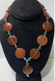 Necklace Made with Carnelian, Turquoise, and Jade..Carnelian stones are 1” across..