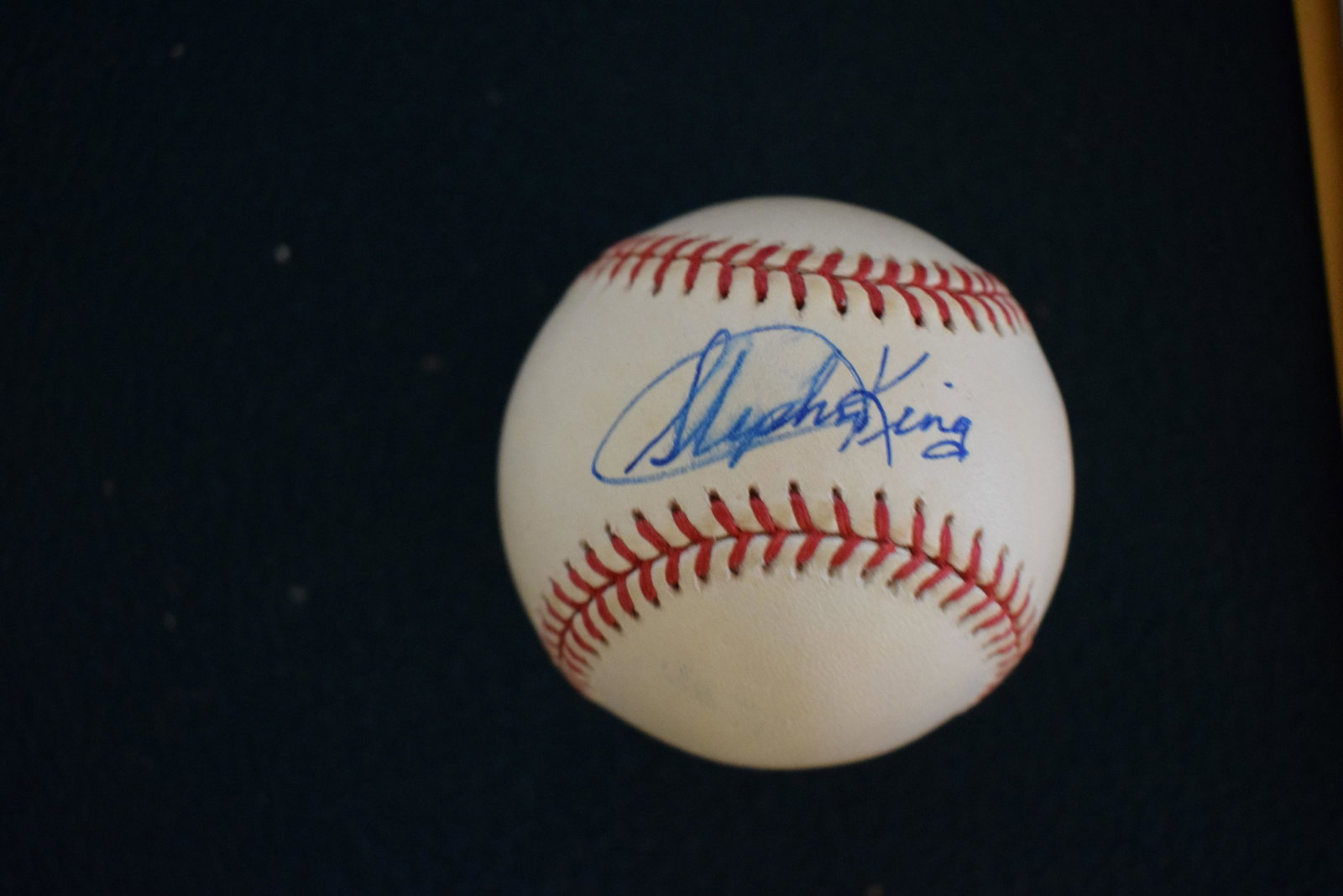 Stephen King signed baseball AUTHOR: This is a unique signed baseball of the horror author, sadly has a smear on the sig, but still very nice.