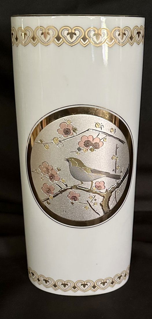 THE ANCIENT ART OF JAPANESE CHOKIN GILDED WITH 24K GOLD & SILVER: This vase celebrates the ancient "Art of Chokin" made with 24K Gold and silver overlay on a purely white vase. Chokin is an art form in Japan whereby copper is engraved and gilded with precious gold a