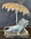 OUTSTANDING 19TH CENTURY GILT METAL LION LAMP WITH CANOPY OF SILVER LEAVES