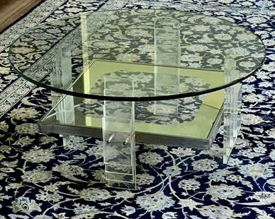 VINTAGE MID CENTURY MODERN SCULPURAL LUCITE AND GLASS COFFEE TABLE: Fabulous and highly unique vintage glass coffee table with a beveled lucite geometrically designed base. The intricate base has alternating horizontal bars forming a second glass platform between chun