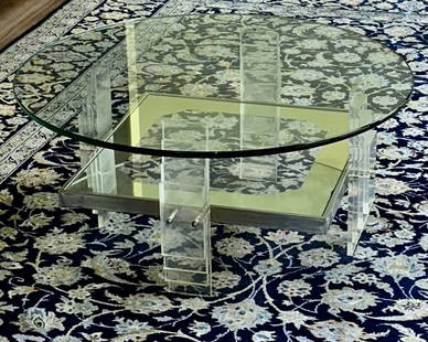 VINTAGE MID CENTURY MODERN SCULPURAL LUCITE AND GLASS COFFEE TABLE: Fabulous and highly unique vintage glass coffee table with a beveled lucite geometrically designed base. The intricate base has alternating horizontal bars forming a second glass platform between