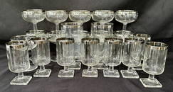 VINTAGE MCM FOOTED CORDIAL AND CHAMPAGNE DOROTHY THORPE SILVER BANDED COLLECTIONS