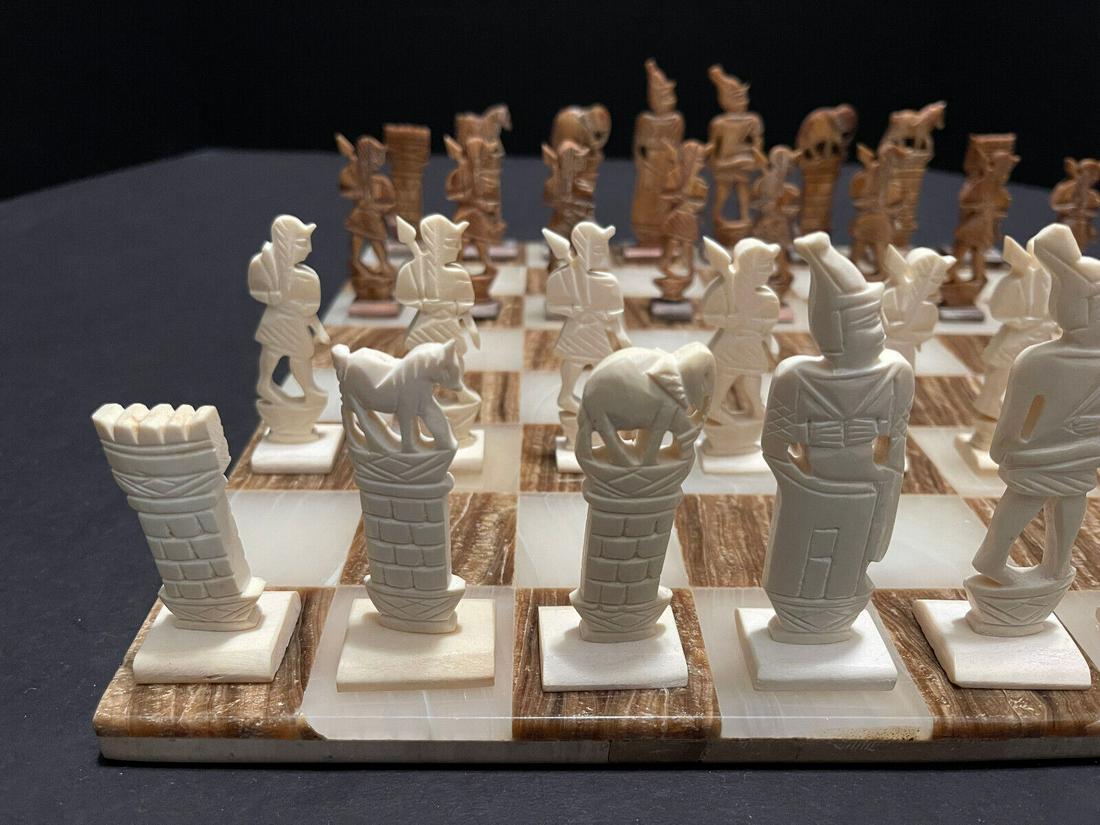 Vintage Artisan Egyptian Camel Bone Chess Set Board: This is one of those rare finds and one-of-a-kind chess sets. Every piece is well-balanced and does not topple easily. The chess is hand-crafted with camel bone by an artisan in Egypt. Color: Multi-Co