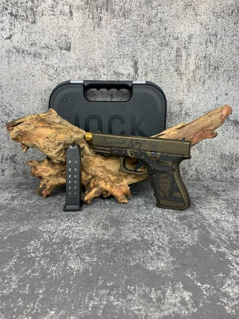 TRUMP GLOCK 19 GEN 4: Love him, hate him, or no opinion, either way a COLLECTIBLE is RIGHT in front of you!! Fully customized Donald trump Glock; suppressor ready, one 15 round magazine, has small scuff at corner, and supr