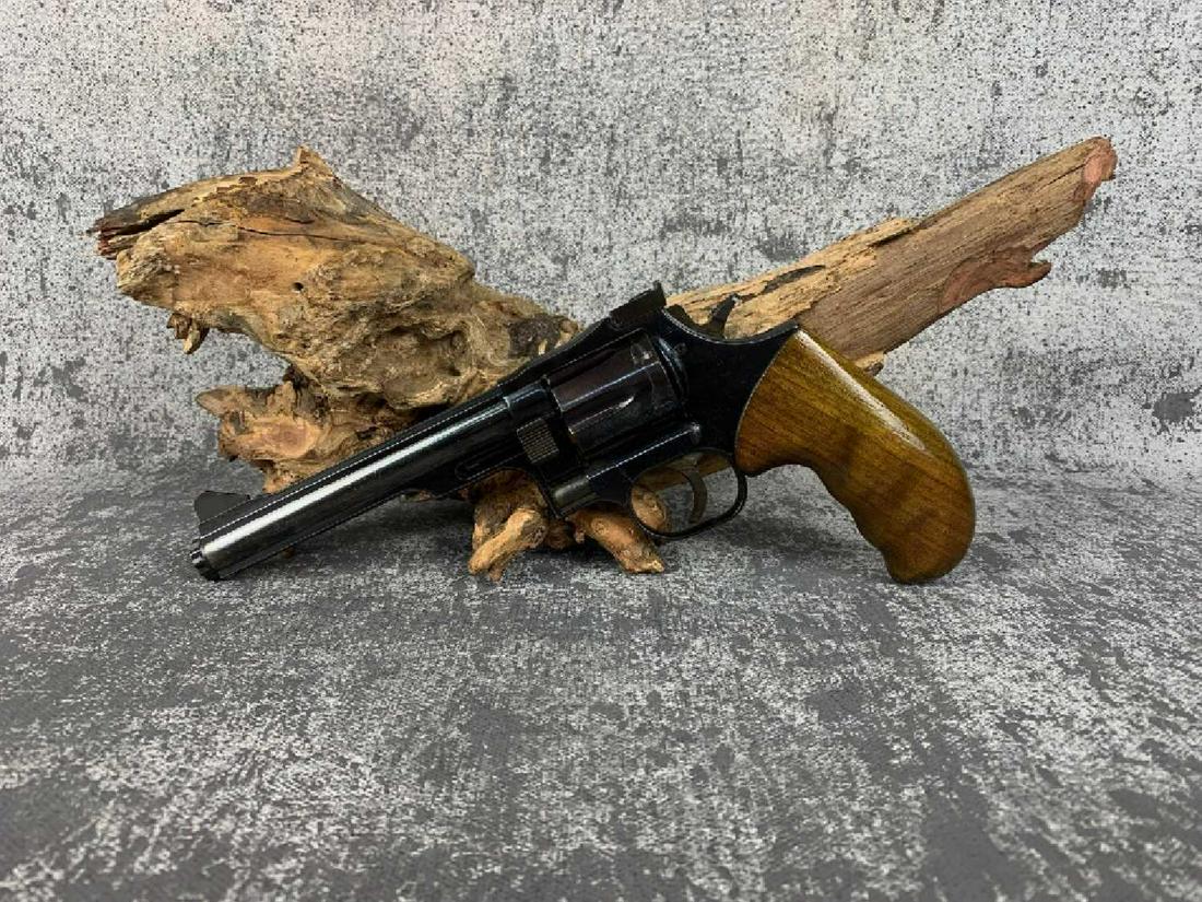 DAN WESSON ARMS W12: This Dan Wesson comes with adjustable rear sights, wood grip, barrel does show signs of holster wear. Please see photos. DAN WESSON ARMS W12 357 MAGNUM DOUBLE ACTION 6" SHINY 4353 VERY GOOD US