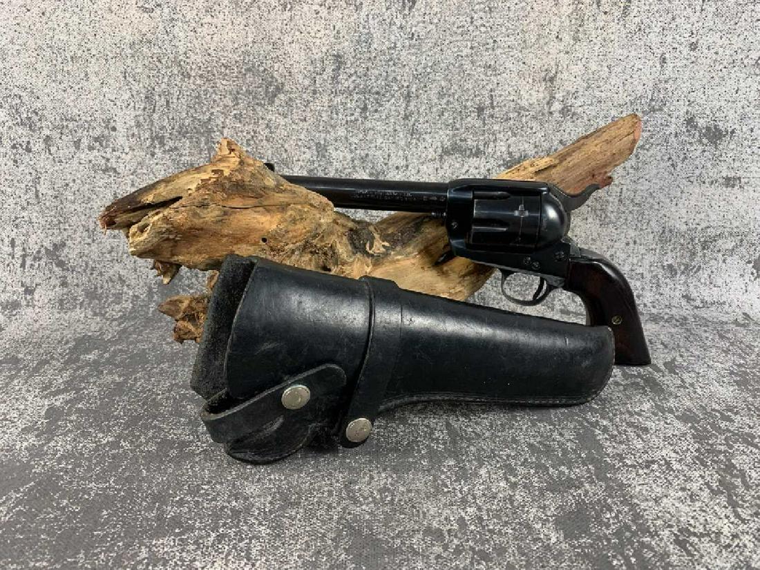 HAWES FIREARMS CO WESTERN MARSHALL: Blade front sight, push rod ejector, wood grips, shows signs of holster and normal wear. multiple proof marks on barrel, comes with a hunter co. leather holster. Please see photos. HAWES FIREARMS CO W