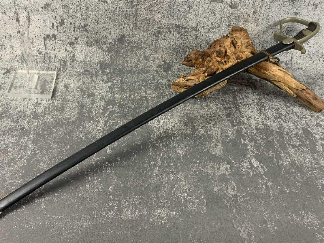 German Sword: German NCO Sword some wear in the handle, Metal scabbard. Great Collectible worthy of more than a few words, your bid tells us where it lands! Good Luck!See Photos! German Sword VERY GOOD