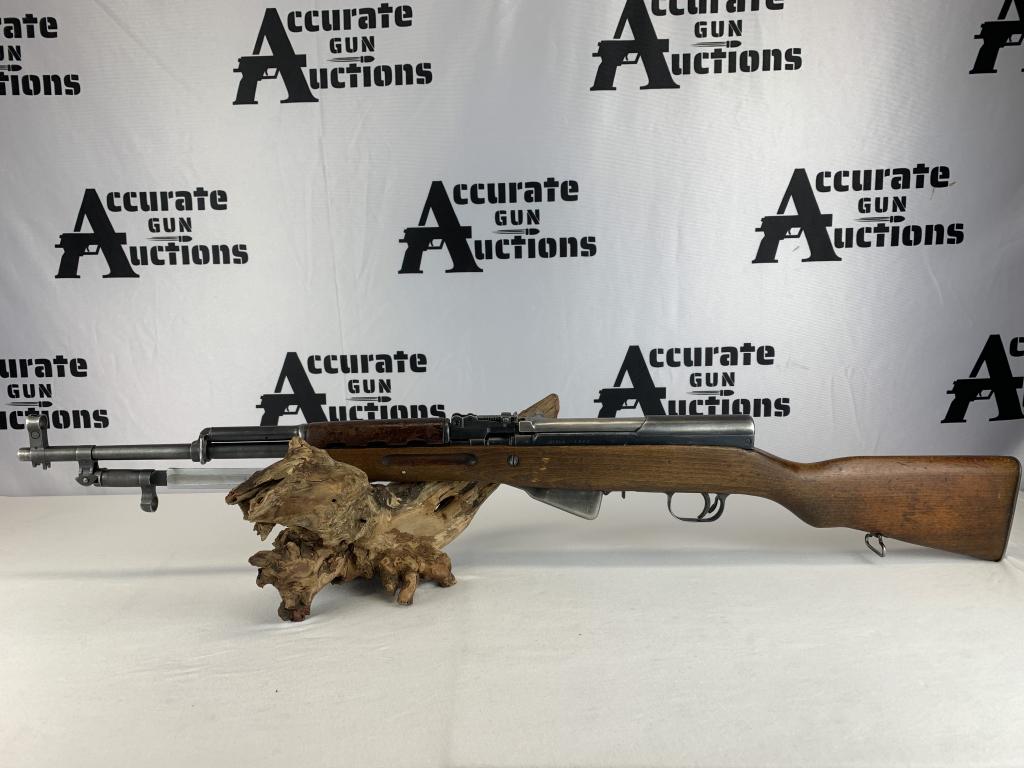 Cugir Romania M-56 SKS 7.62x39: With an overall length of 40” receiver marked w arrow in triangle & dated 1960. Tangent rear sight graduated to 1,000m. Hooded post front sight. Folding bayonet with 9.5” fluted blade. Har