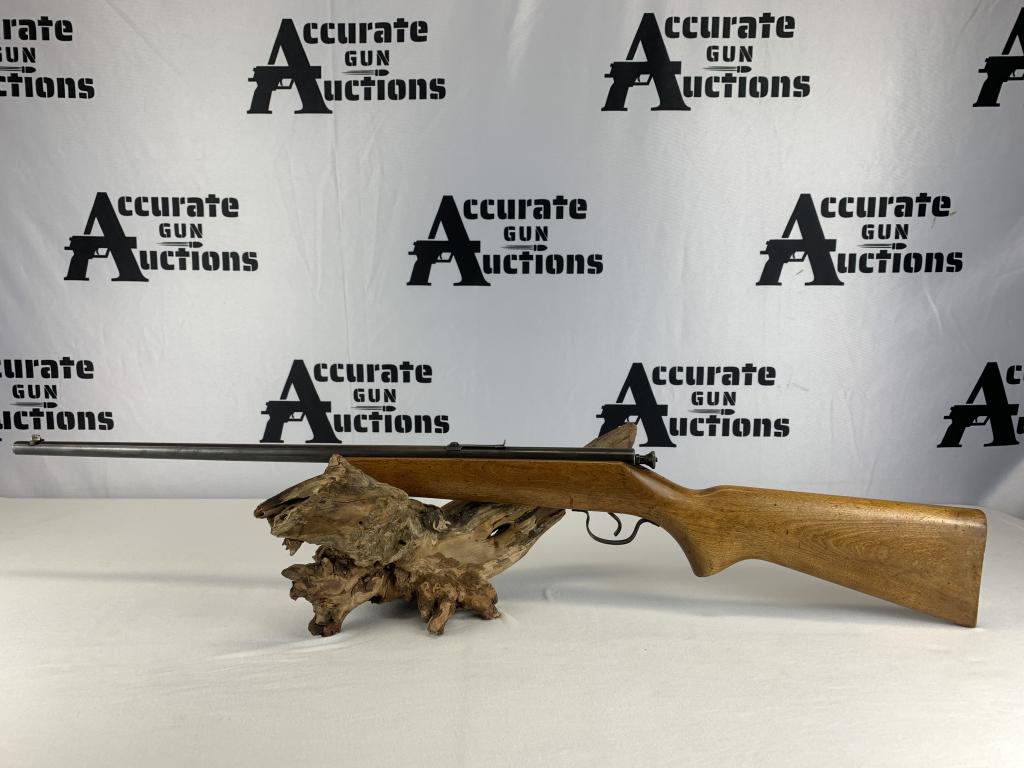 J.C. Higgins 101.24 22 LR: With an overall length of 37.5" Pre 1968, no serial number. 22" barrel with very good bore. Mostly smooth metal with finish turning brown. Adjustable rear sight and static front sight. Very Good wood 
