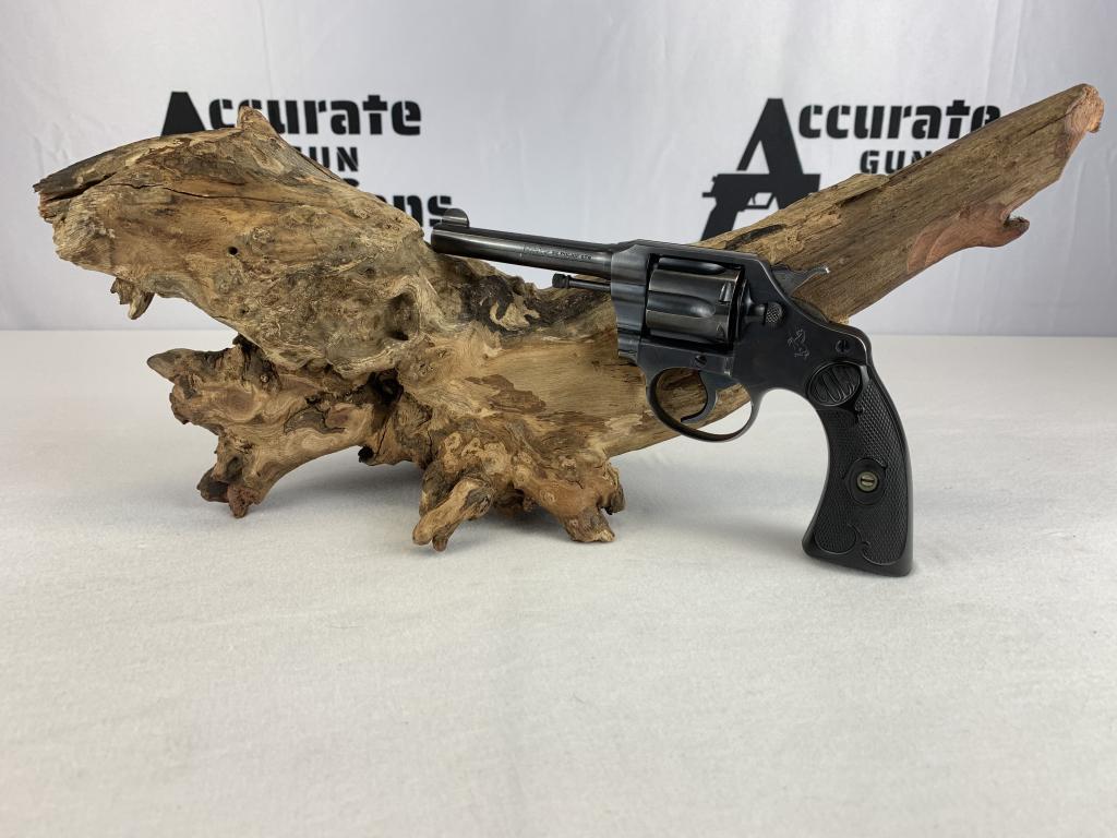 Colt Police Positive 32: Sporting Colt's standard hard rubber grips, 1922 in the first issue of the Police Positive revolvers. The revolver's sights consisted of a half-moon blade front with a fixed iron open rear sight, whic
