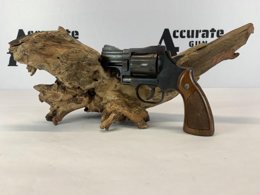 Dan Wesson 14-S .357 Magnum: Offered today is a Dan Wesson 14-3 chambered in .357 Magnum! This revolver has a ramp front sight, some light pitting, and wooden grips with DW inlayed medallions. Please see photos.