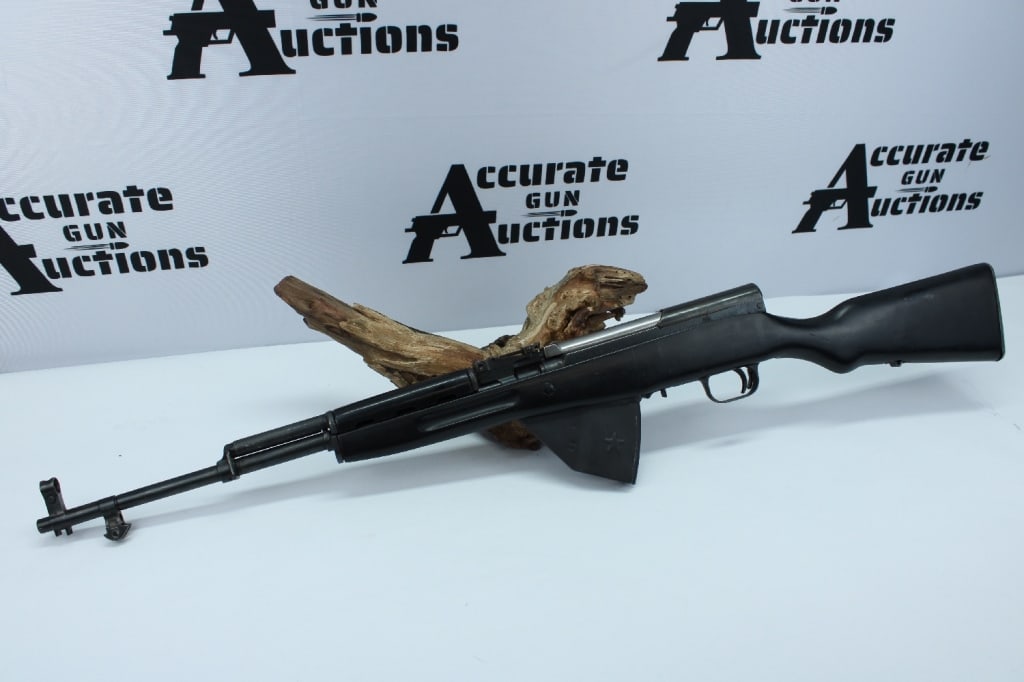 IO Inc M56 7.62x39: This IO Inc is a Chinese made M54 chambered in 7.62x39mm. The semi-automatic rifle features a post front sight and adjustable rear, star magazine, and bayonet and sling mounts. The rifle is in good sh