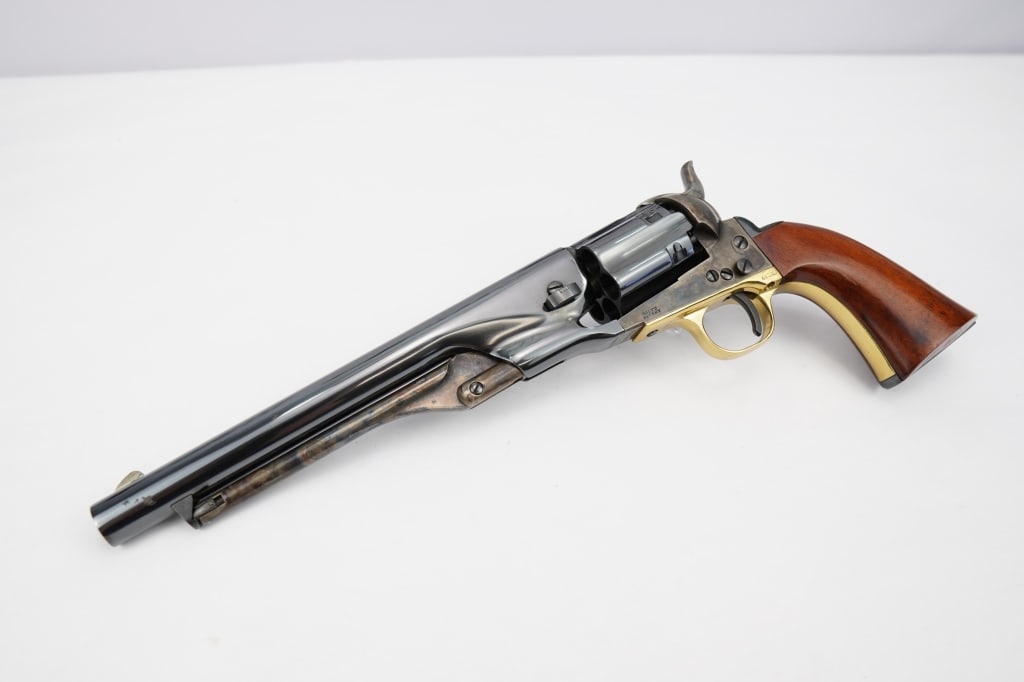 Unknown Navy Replica .44 BP: This Italian made Colt Navy replica is chambered in .44 bp and features a case hardened receiver, 8" barrel, and comes with a box. Please see photos.