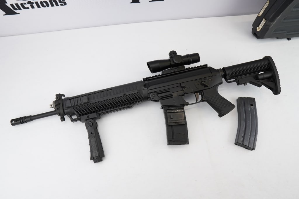 SIG SAUER SIG 556 5.56 NATO: The SIG Sauer 556 is the semi-automatic variant of the SG 550, a Swiss battle rifle chambered in 5.56 NATO. It differs from the original with its aluminum lower receiver that accepts M16 magazines. Th