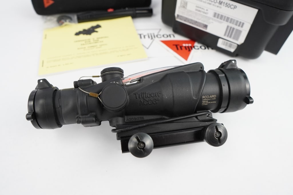 Trigcon ACOG 4X32 ARMY RCO-M150: The TA31RCO is an Advanced Combat Optical Gunsight (ACOG) designed for the US Army's M4 weapon system (14.5" barrel). It incorporates dual illumination technology using a combination of fiber optics a