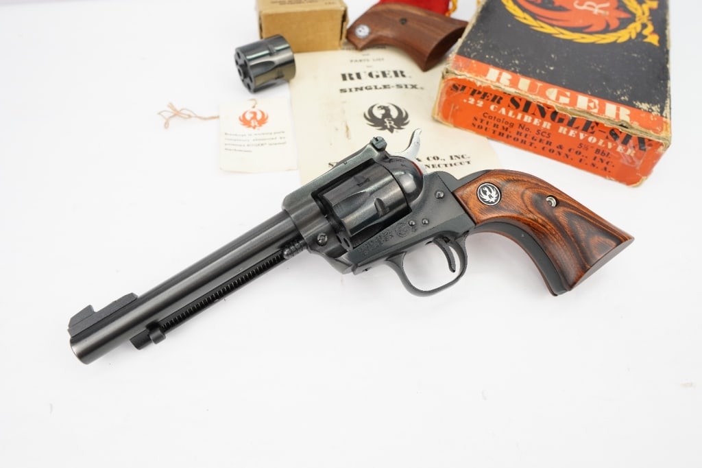 Ruger Single Six .22 CAL: This Ruger Single-Six is a stunning piece to add to any collection. Chambered in .22 this single action revolver features a 6.5? barrel and comes with the factory box, extra grips, and a second cylind