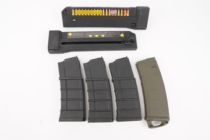 Four Misc Magazines/ Speedloaders 5.56/.223