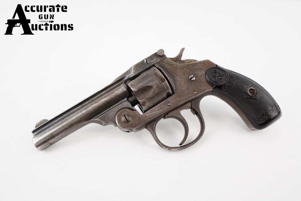 Iver Johnson Top Break .32 Short: Iver Johnson Top Break revolver chambered in .32 Short. The revolver is in good condition and has a chip in the grip. Please see photos.