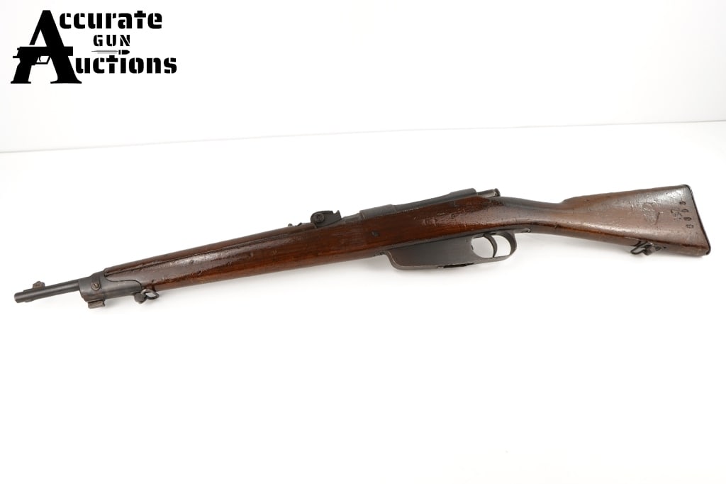 Brescia M91 Carcano 6.5: The Brescia Arsenal was a small arms factory located in Brescia, Italy, and active from the early 19th century to the end of World War II. This M91 Features a 18" barrel and is chambered in 6.5 calibe