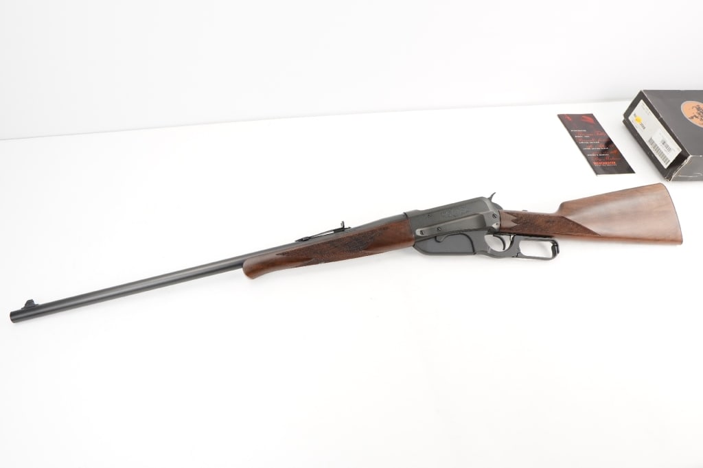 Winchester 1895 Grade 1 30-06: This Model 1895 Grade I has a more modest degree of embellishment, yet still uniquely beautiful. On each side of the receiver the upper scallop is enhanced with a beautiful cluster of Nimschke-style s