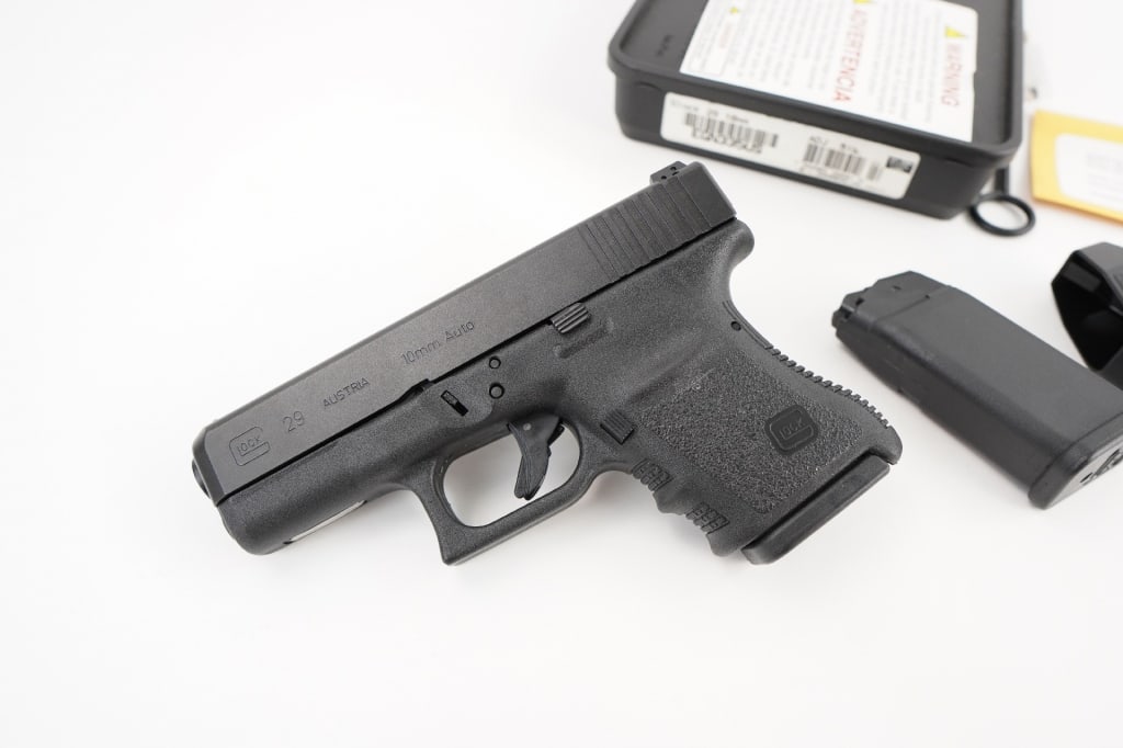 Glock 29 10 MM: you need 10mm power, in a small package, This sub compact Glock chambered in 10mm might be right for you! 3.8" barrel length. Black Nitron finishes to slide with black synthetic frame featuring finger
