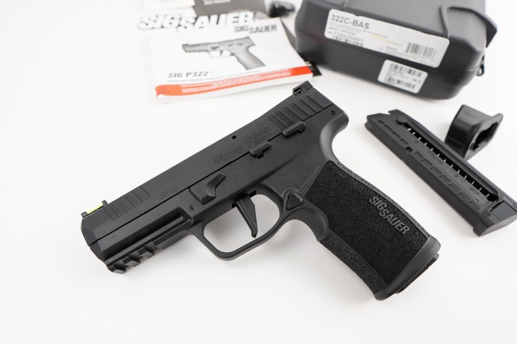 SIG SAUER P322 .22 LR: The Sig Sauer P322 Semi-Auto Pistol with Manual Safety is loaded with premium features. The familiar styling of the polymer grip module features a beveled magwell and integral accessory rail for a lig