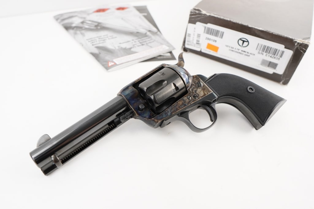 Taylor's & CO 1873 SA 9mm: This 1873 single action is a perfect combination of the old west and today's modern cartridge ammo. It features a steel blued frame with blued steel parts. It is fit with a checkered walnut Army size 