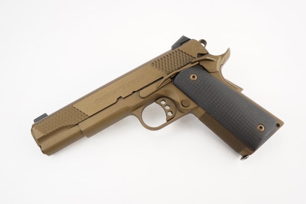 Christensen 1911 .45 ACP: Christensen Arms 1911 chambered in .45 ACP MATCH and is sold with one magazine and features a 5 inch barrel. The pistol is finished in burnt bronze finish and is equipped with Trijicon night sights. T