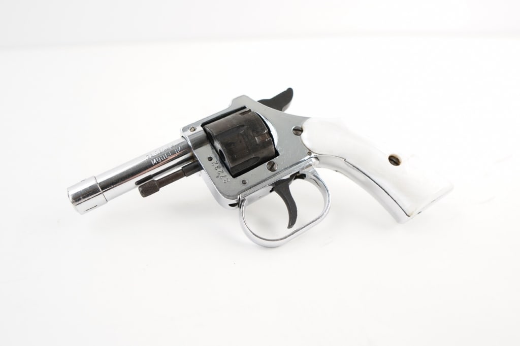 Imperial Metal IMP .22 Short: The Imperial Metal Products, Inc. IMP revolver. This is a six-shot, single/double action revolver chambered in 22 short and features pearl style grips, a 2.5 inch barrel, and fixed sights. This remain