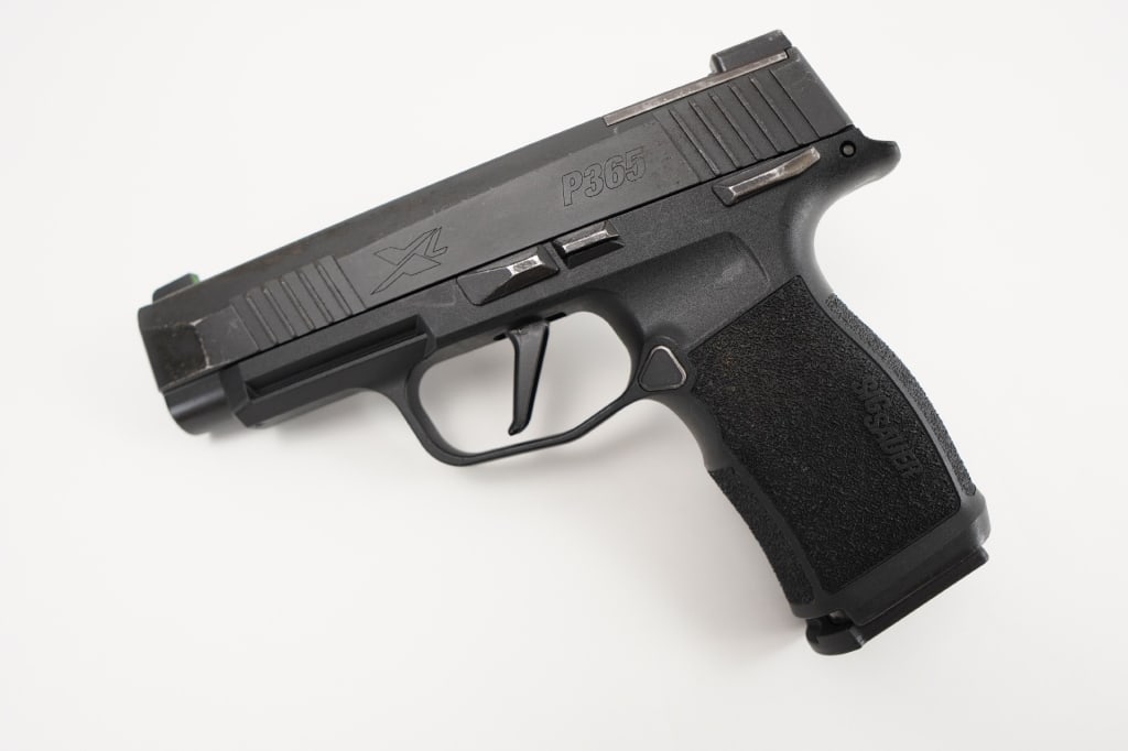 Sig Sauer P365 XL 9mmx19: The 365XL packs 12+1 or available 15+1 capacity in this micro-compact, highly concealable size, yet maintains the shootability of a full-size pistol. This semi-automatic pistol is chambered in 9mm and