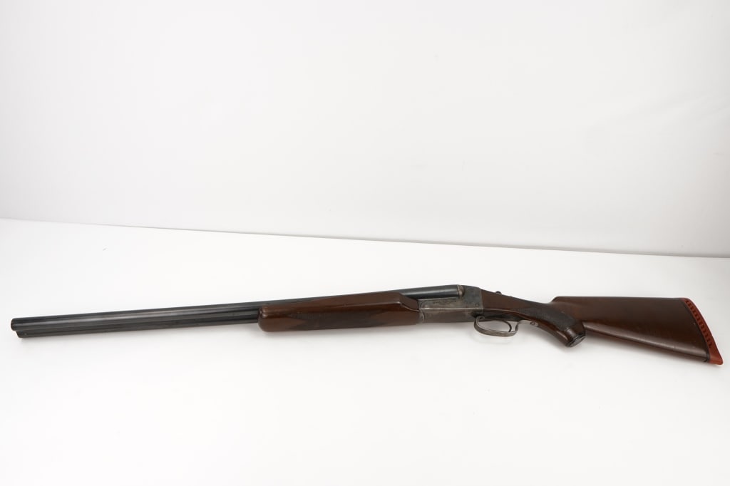 Ward's Hercules 12 GA: Wards Hercules Model 50 double barrel side by side 12 gauge shotgun. This shotgun utilizes two 28” round blue barrels chambered in 12 GA. The top of the barrels are marked Selected Forged Steel 
