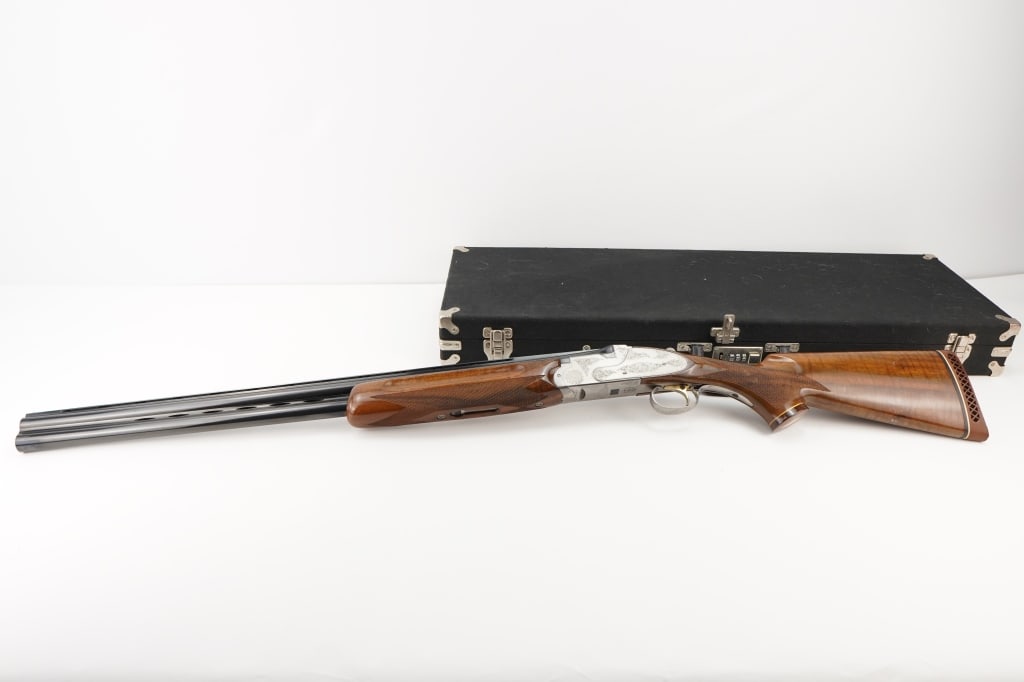 Weatherby Athena 12 GA: Weatherby Athena chambered in 12 GA and features 28" barrels. Made in Japan, these guns are highly durable and stout. This gun has a wide low profile ventilated top rib with slightly mashed brass fron