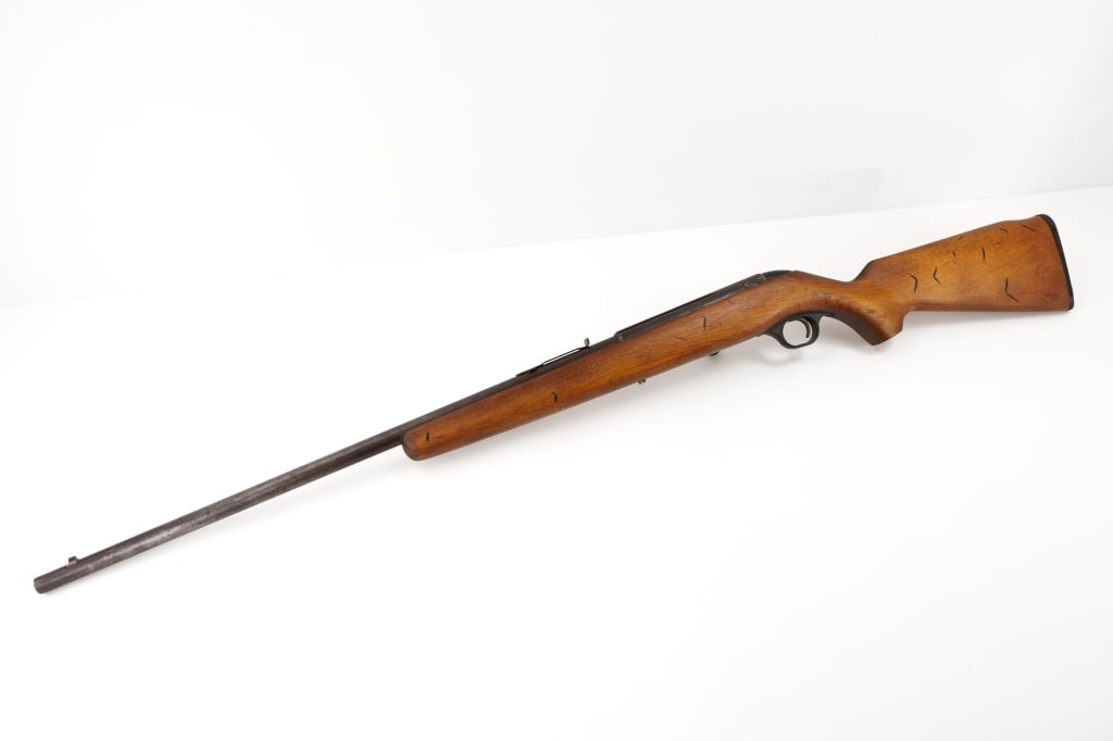 Western Auto Supply Co. R100B 22 S-L-LR: This rare Western Auto Supply Co. R100B .22 rifle, manufactured by High Standard from 1956-1964, combines reliability with vintage charm. Featuring a sleek design and precise craftsmanship, it showcas