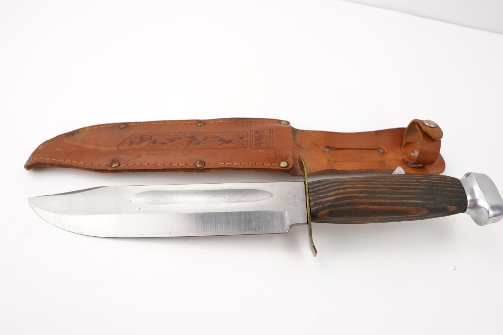 Wildcat 8X: Bowie knife with sheath. Please see the photos.
