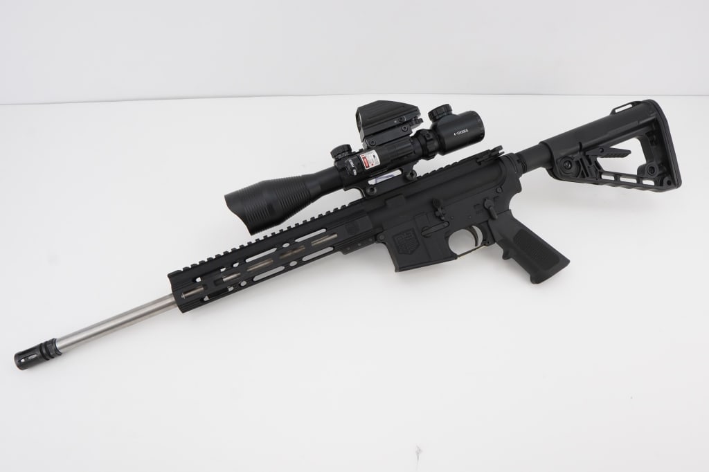 Diamondback DB-15 5.56: This Diamondback DB-15 5.56 rifle features a durable aluminum frame and a 20-inch barrel, optimized for precision and reliability. Equipped with a high-quality optic for enhanced accuracy, it boasts a