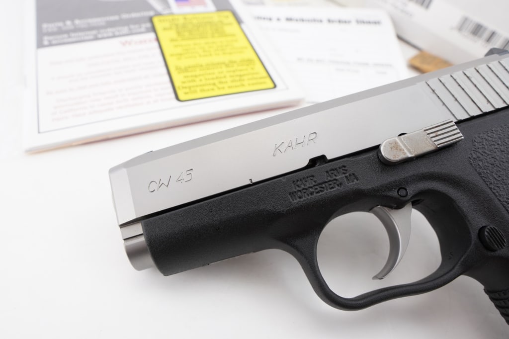 Kahr Arms CW45 .45 ACP: This Kahr Arms CW45 chambered in .45 ACP features a 3.64-inch barrel, polymer frame, and stainless steel slide for enhanced durability. Known for its reliability and compact size, it's ideal for conce