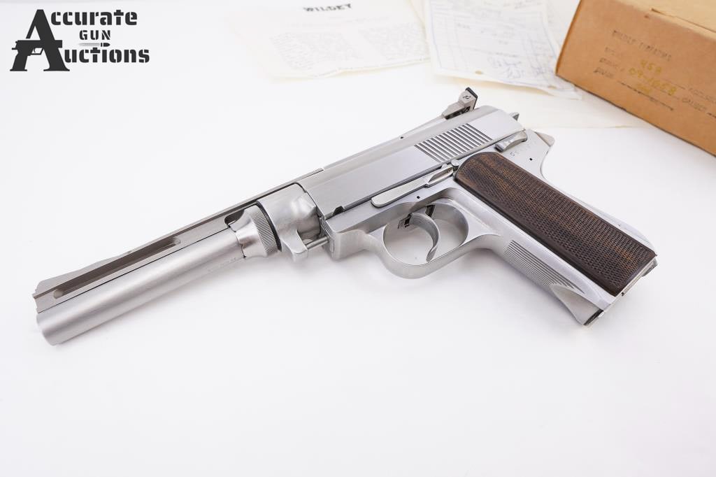 Wildey Firearms Co Survivor .45 Win Mag: The Wildey Survivor in .45 Win Mag is a distinctive semi-automatic pistol renowned for its power, unique design, and versatility. Designed by Wildey J. Moore in the early 1980s, the Survivor is engine