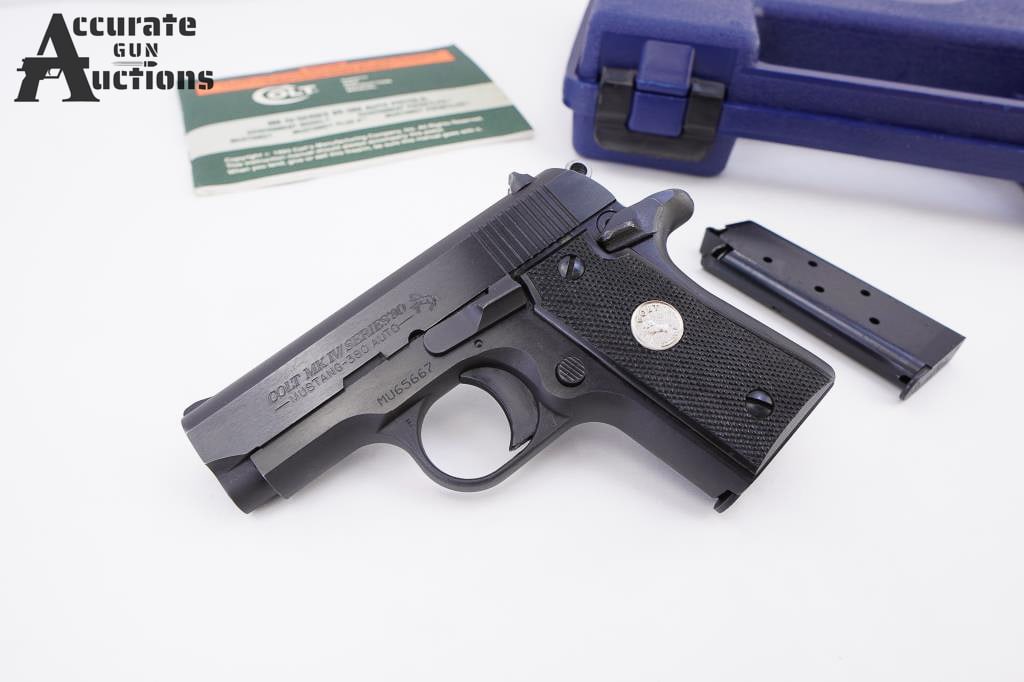 Colt Mustang .380 Auto "1994": Manufactured in 1994 as per serial number. This sub compact pistol features a deep blued finish with standard sights, round spur hammer, thumb safety, 2 - 6 rnd magazines, and checkered polymer factor